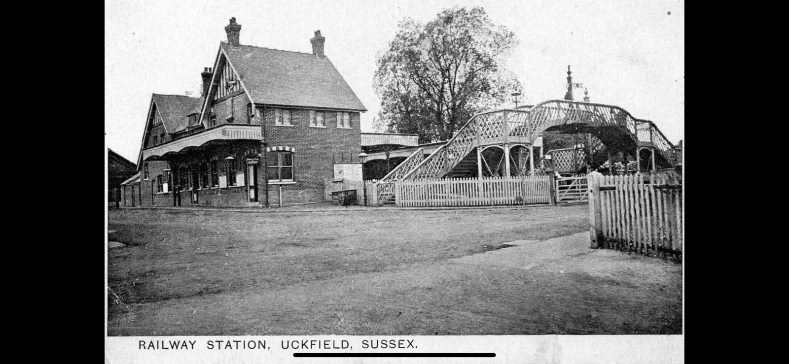 Vintage black and white photograph of a railway station in Uckfield, Sussex.
